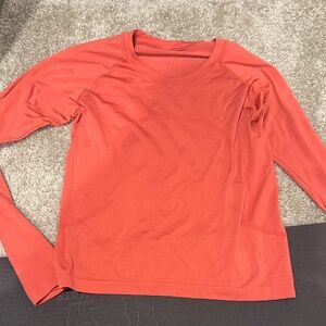 Lululemon women’s swiftly coral Top